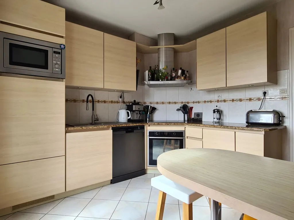 Acheter une maison familiale au Mans avec cinq chambre et un grand jardin