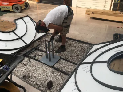 Plantation de palmiers stabilisés en galerie marchande sur Avignon