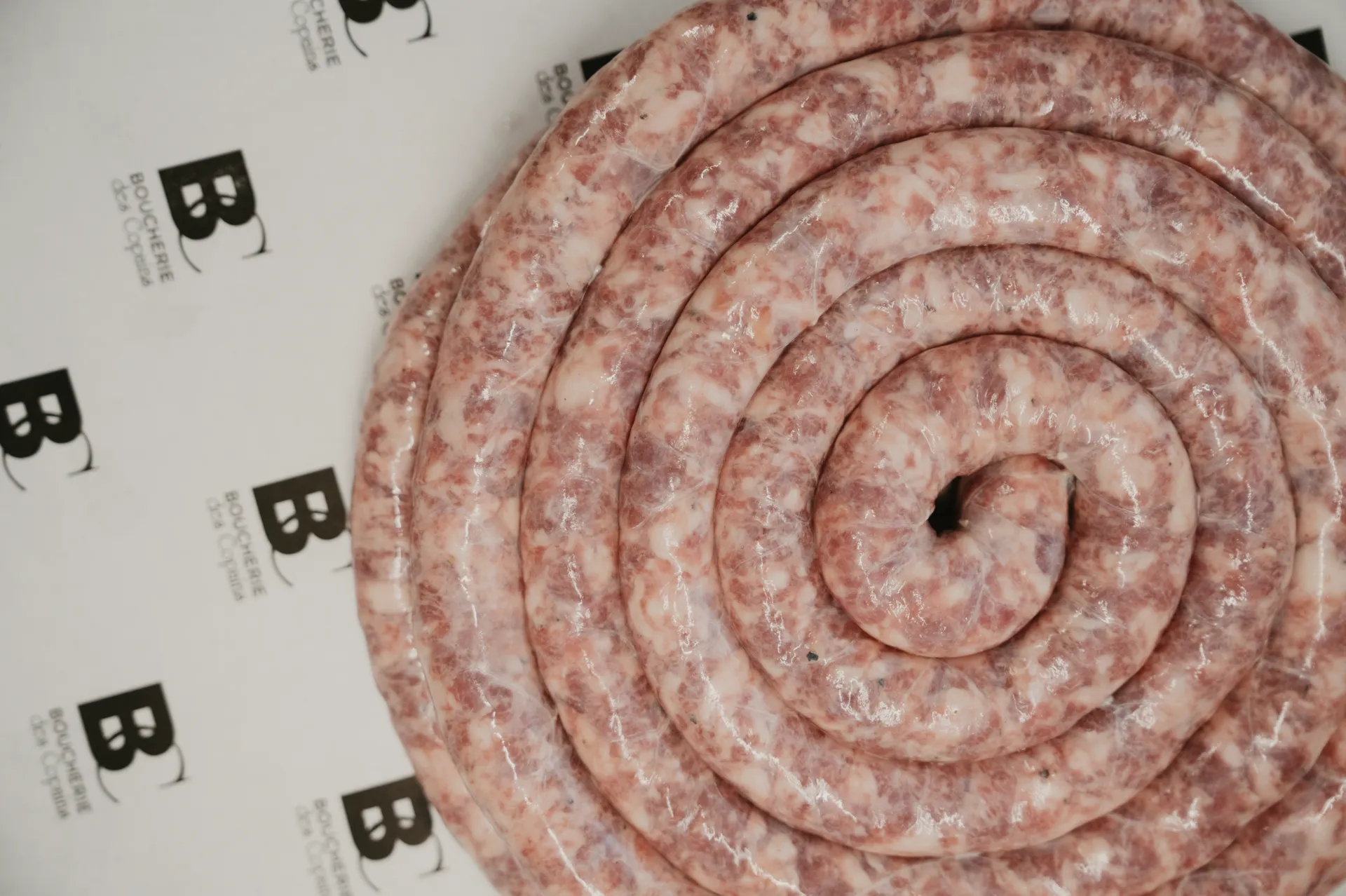 Saucisse de Toulouse maison : pourquoi elle reste l’incontournable des boucheries artisanales à Toulouse ?