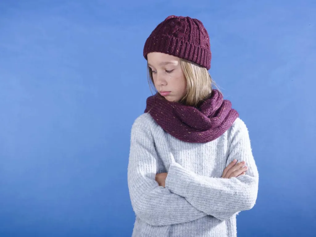 Photographe bonnet écharpe sur modèle