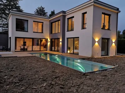 Réalisation d'un couloir de nage en inox de 3x12m avec skimmer miroir avec longueur de piscine à Dardilly près de Lyon