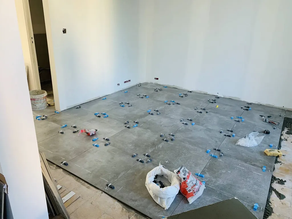 pose de carrelage collée sur support existant à Marignane 13700
