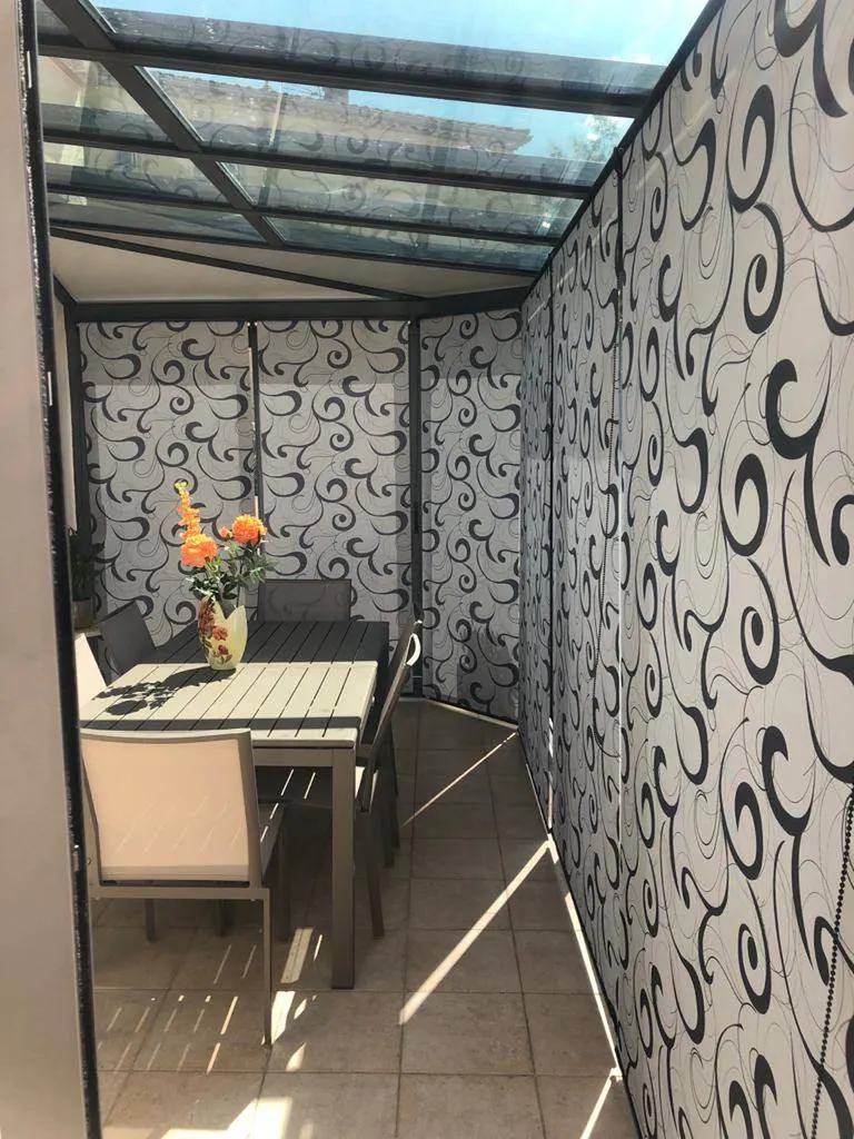 Installation de store intérieur dans une véranda près de Nîmes dans la commune de Quissac