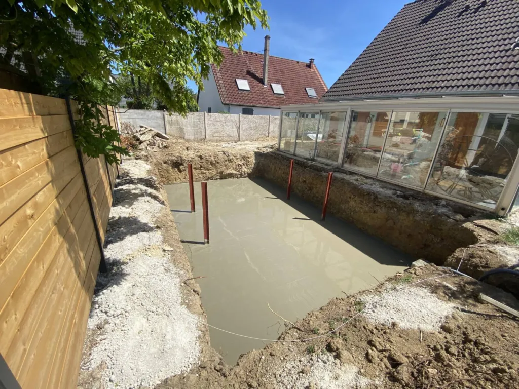 Dalle béton d'une piscine d'une maison individuelle à Strasbourg CLK 
