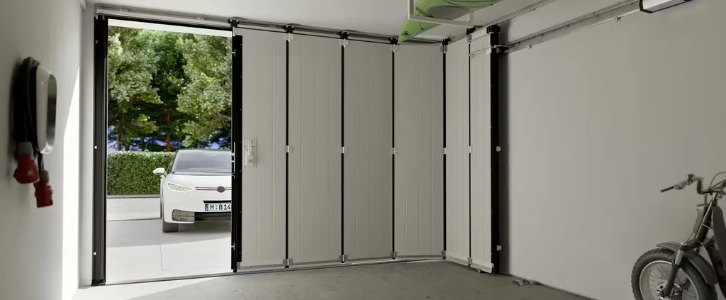 Installer une porte de garage coulissante latérale en Corse-du-Sud : la solution idéale pour les garages à faible hauteur sous plafond ou à accès contraint