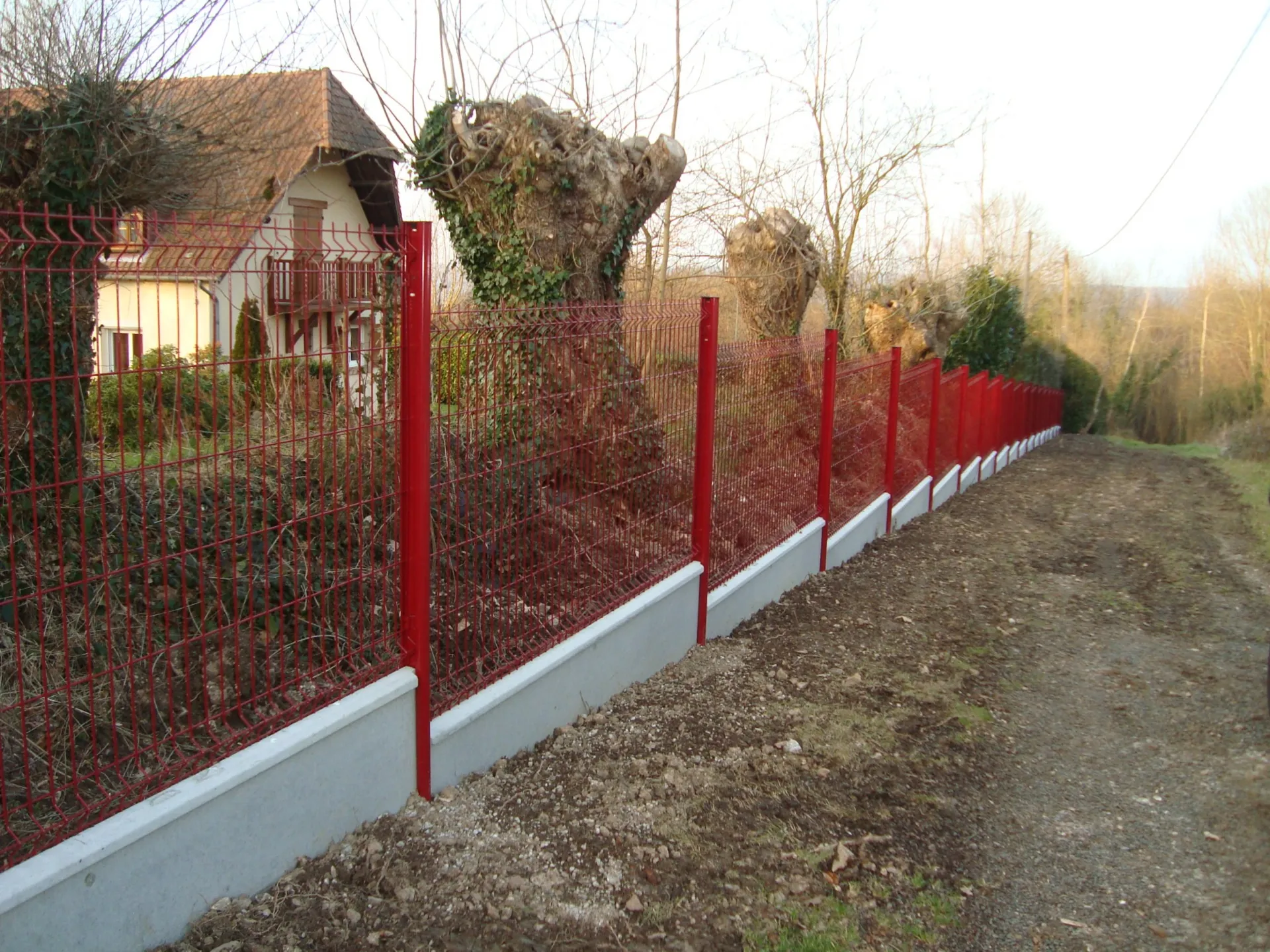 Installation de clôtures en paneaux de couleur à Beuzeville 27