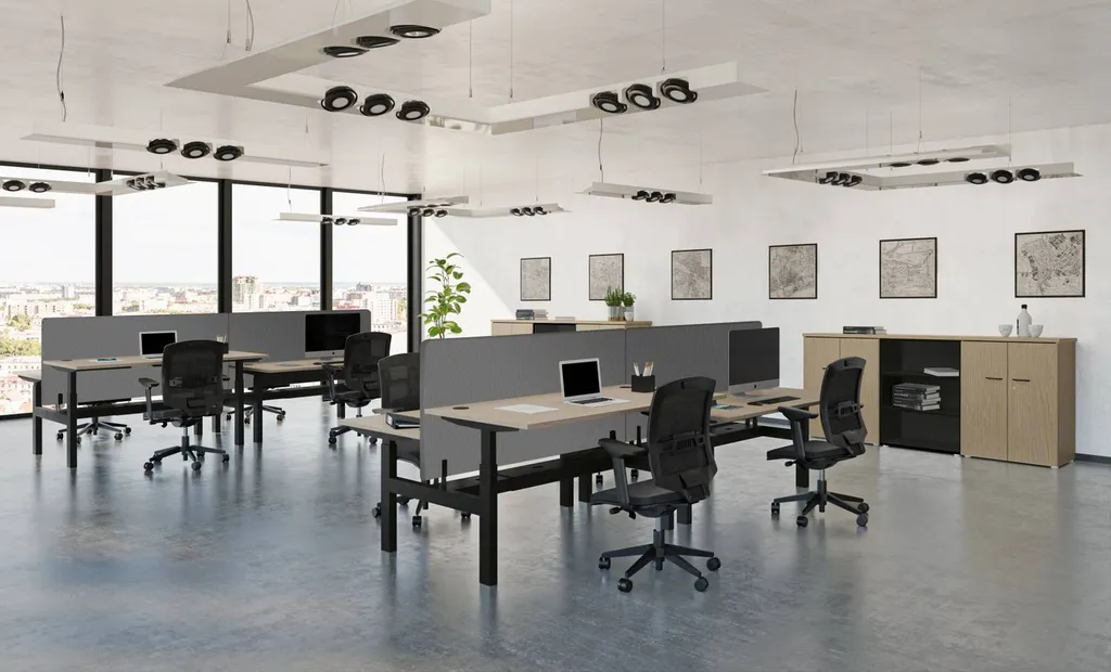 Open-space avec bureaux réglables en hauteur à Marseille