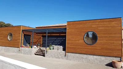 Construction d’une maison à ossature bois sur-mesure pour habitat écologique et confortable au Grau d’Agde