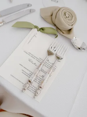 cutlery and wedding decoration on table