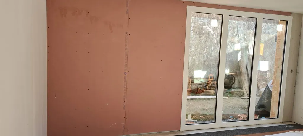 Plaque de placo coupe-feu pour poêle à bois ou poêle à granules dans une maison à Blanquefort proche de Bordeaux