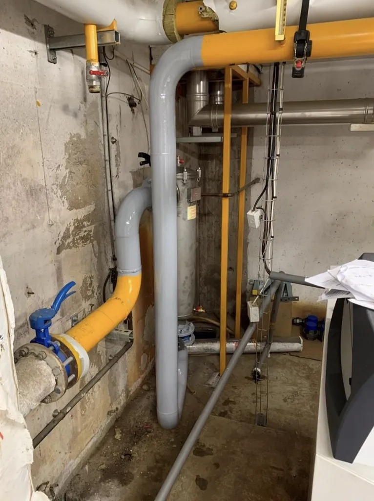 Pose pot à boue passage intégral et calorifuge pour protection chaudières chaufferie et performance durable