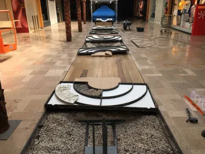 Plantation de palmiers stabilisés en galerie marchande sur Avignon