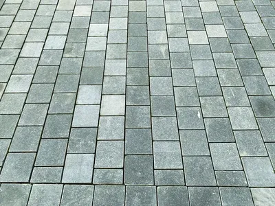 Pavés en pierre naturelle : solutions pour aménagements extérieurs