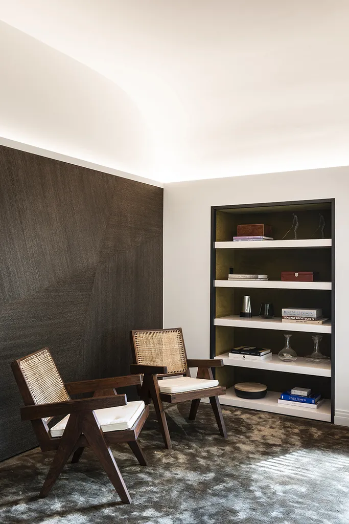 Bibliothèque intégrée élégante et fonctionnelle sur mesure par une architecte d'intérieur