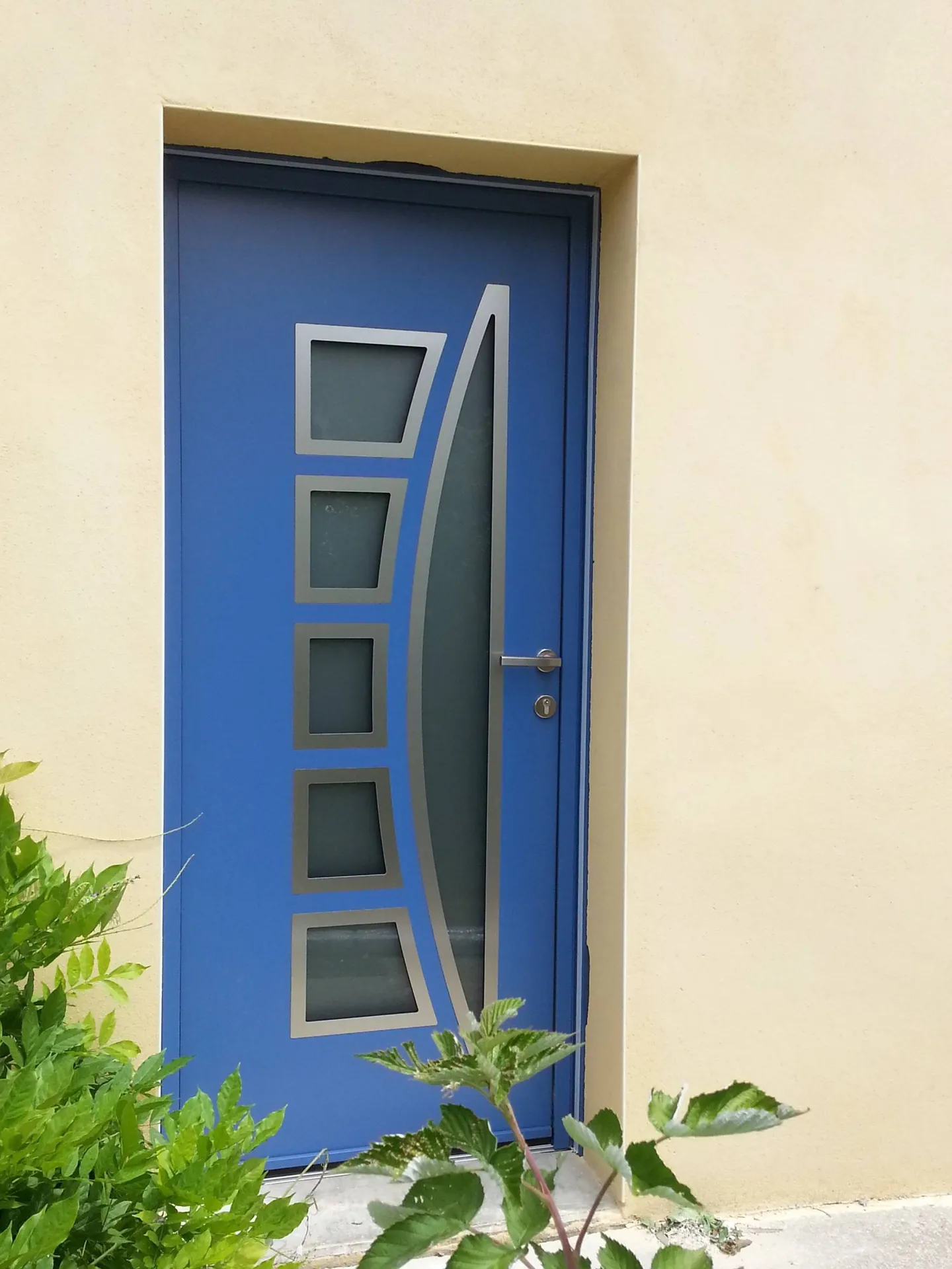 Travaux de rénovation d'un porte en alu sur mesure