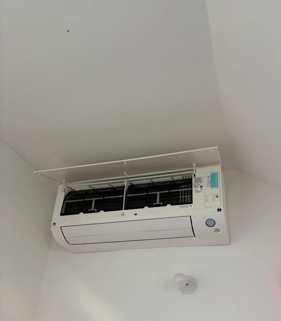Entretien d’une climatisation réversible Split Daikin dans une maison au Raincy