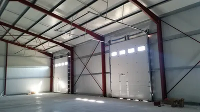 porte sectionnelle rails standard pour batiment industriel