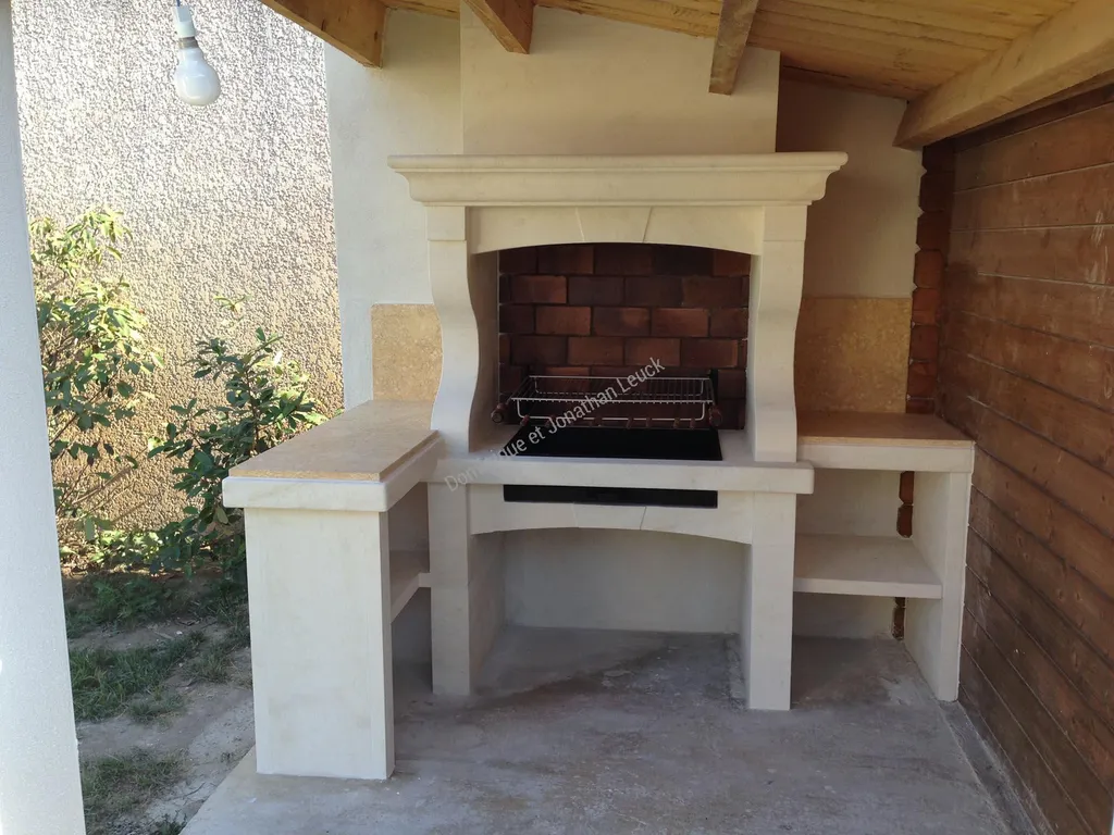 Aménagement cuisine d'été en pierre et granit