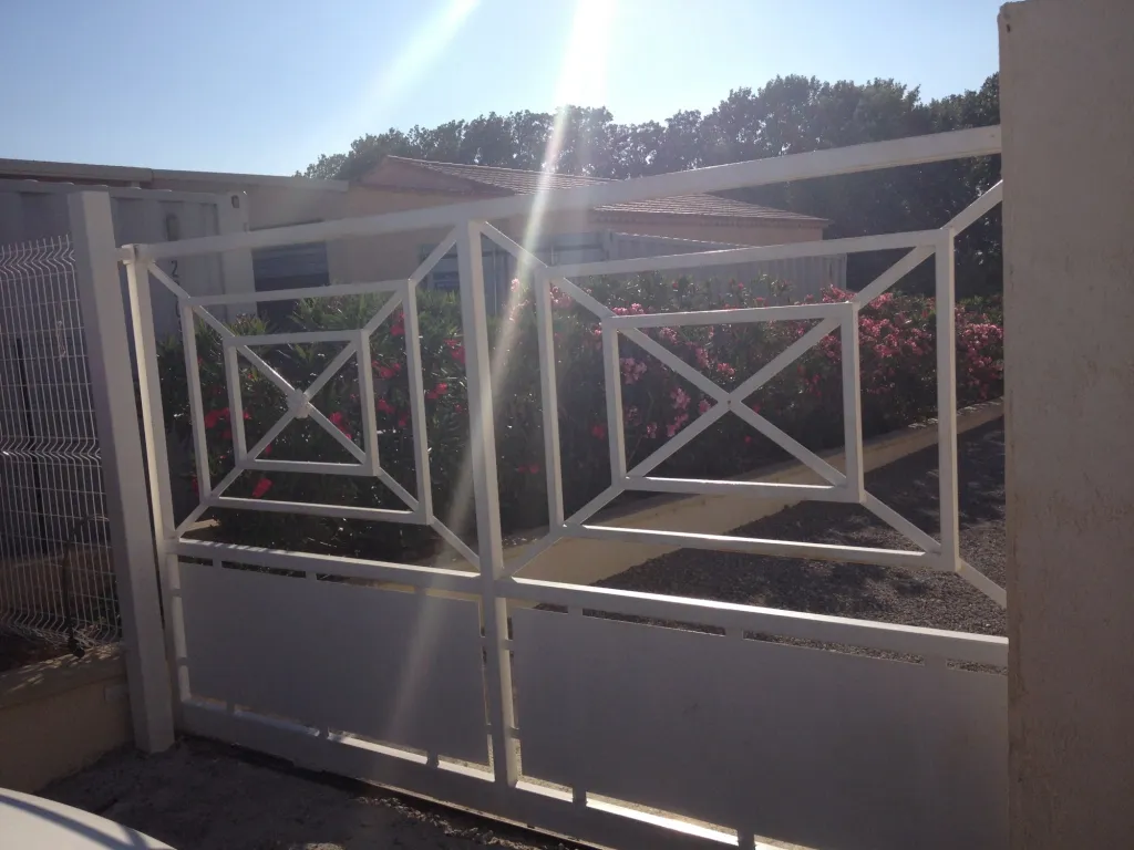 FABRICATION PORTAIL COULISSANT EN FER FORGE MARTIGUES 13