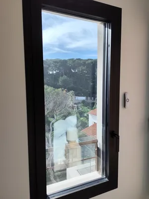 Pose de films solaire anti chaleur sur un puit de lumière et fenêtres chez un particulier au Rove 13