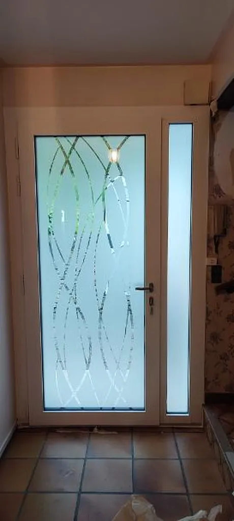 Porte d'entrée entièrement vitrée à Corcelles les Monts