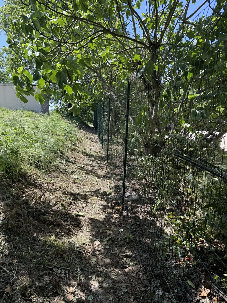 Pose de clôture souple verte 1m80 à Saint-Jean proche Toulouse : installation clôture jardin et sécurisation terrain par LT PAYSAGE