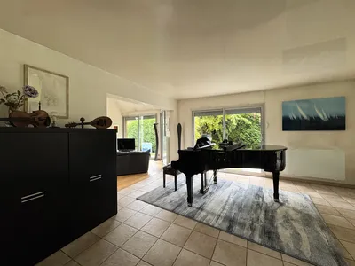 piano à queue dans le séjour Helix immobilier 