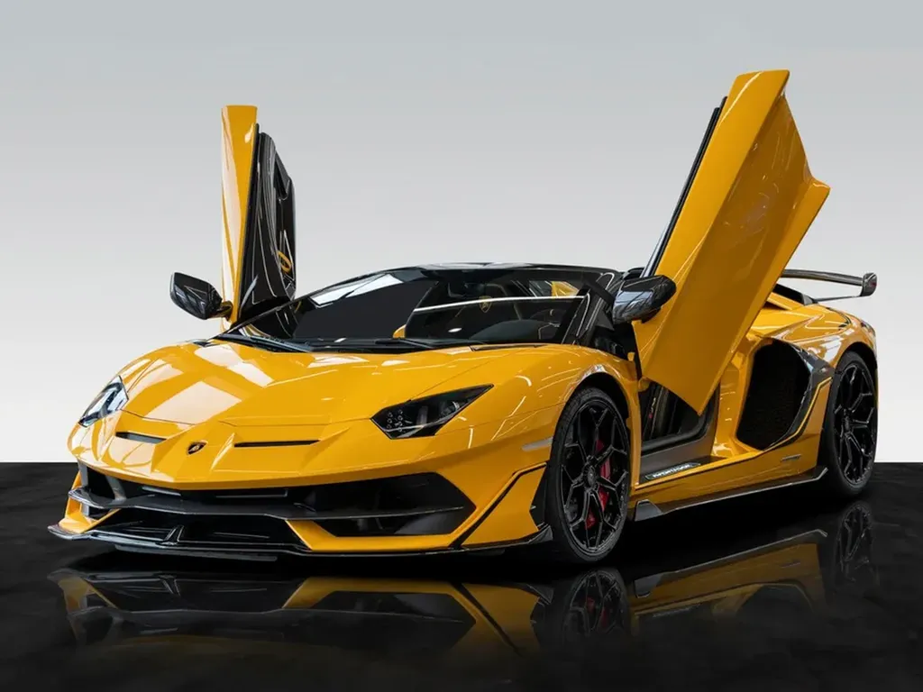 Lamborghini Aventador SVJ Roadster à Bordeaux avec portes papillon ouvertes, symbole ultime du luxe automobile, de la performance et du prestige italien.