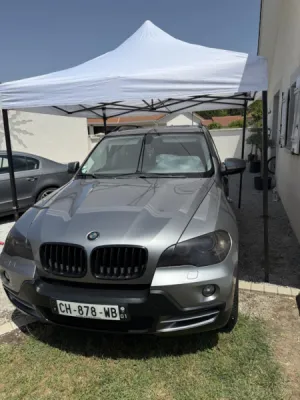 BMW X5 remis à neuf : lustrage complet et restauration des plastiques ternis à Cuzieu près d'Andrézieux-Bouthéon