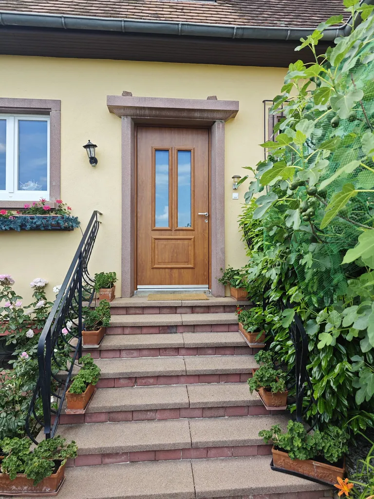 Porte d'entrée gamme EXCLUSIVE de couleur Chêne Doré extérieur et Blanc intérieur