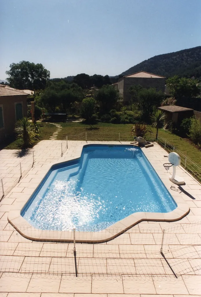 PISCINE COQUE COSMOPOLITAN TROPICAL - 11M X 5M40