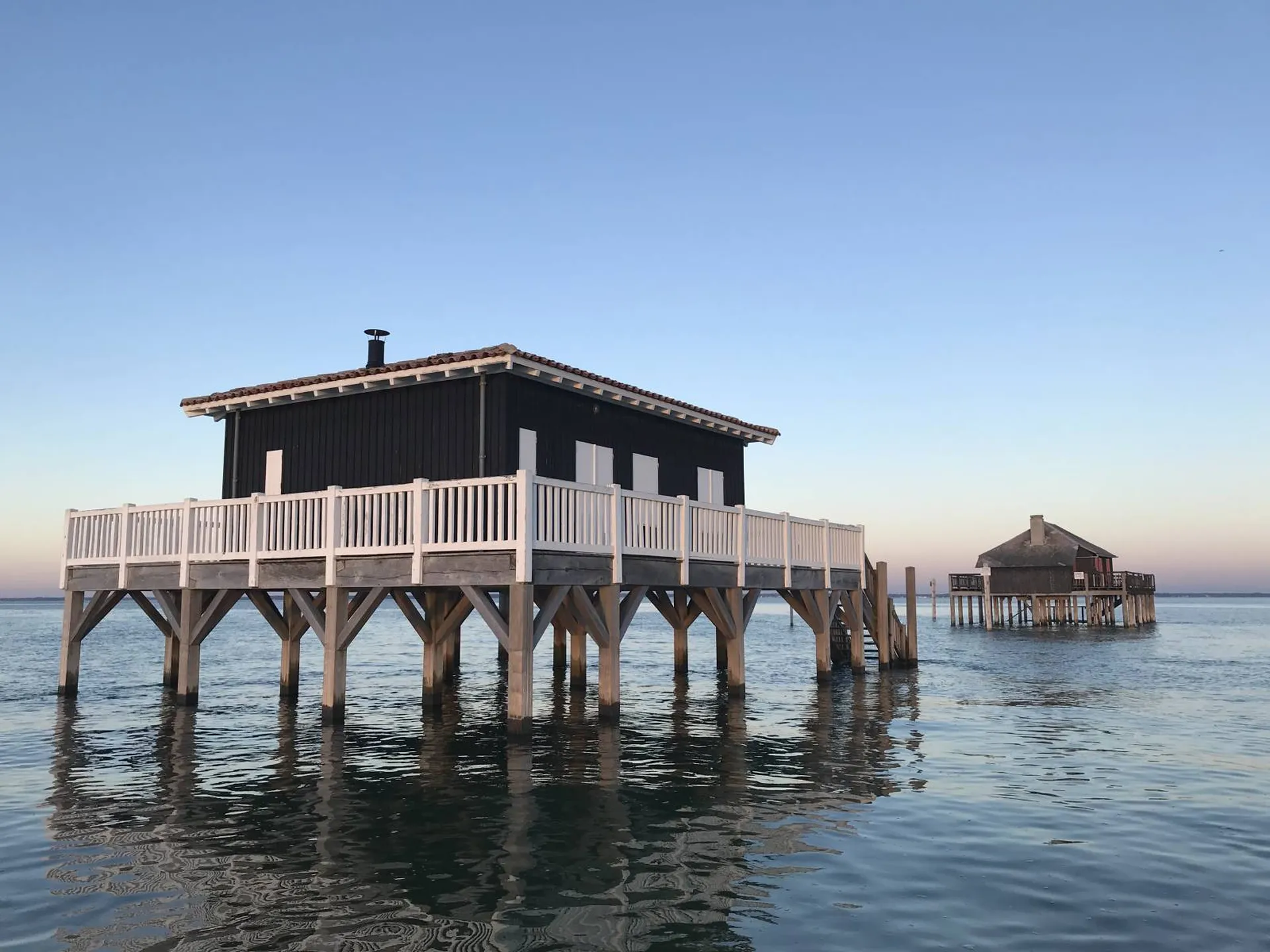 Visiter les cabanes tchanquées en bateau au Cap Ferret 