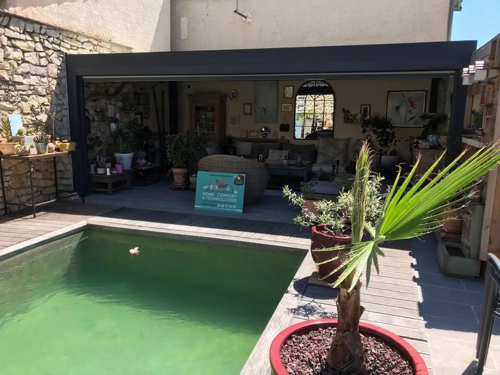 Installation d'une pergola bioclimatique sur mesure avec store screen à Nîmes près de Montpellier