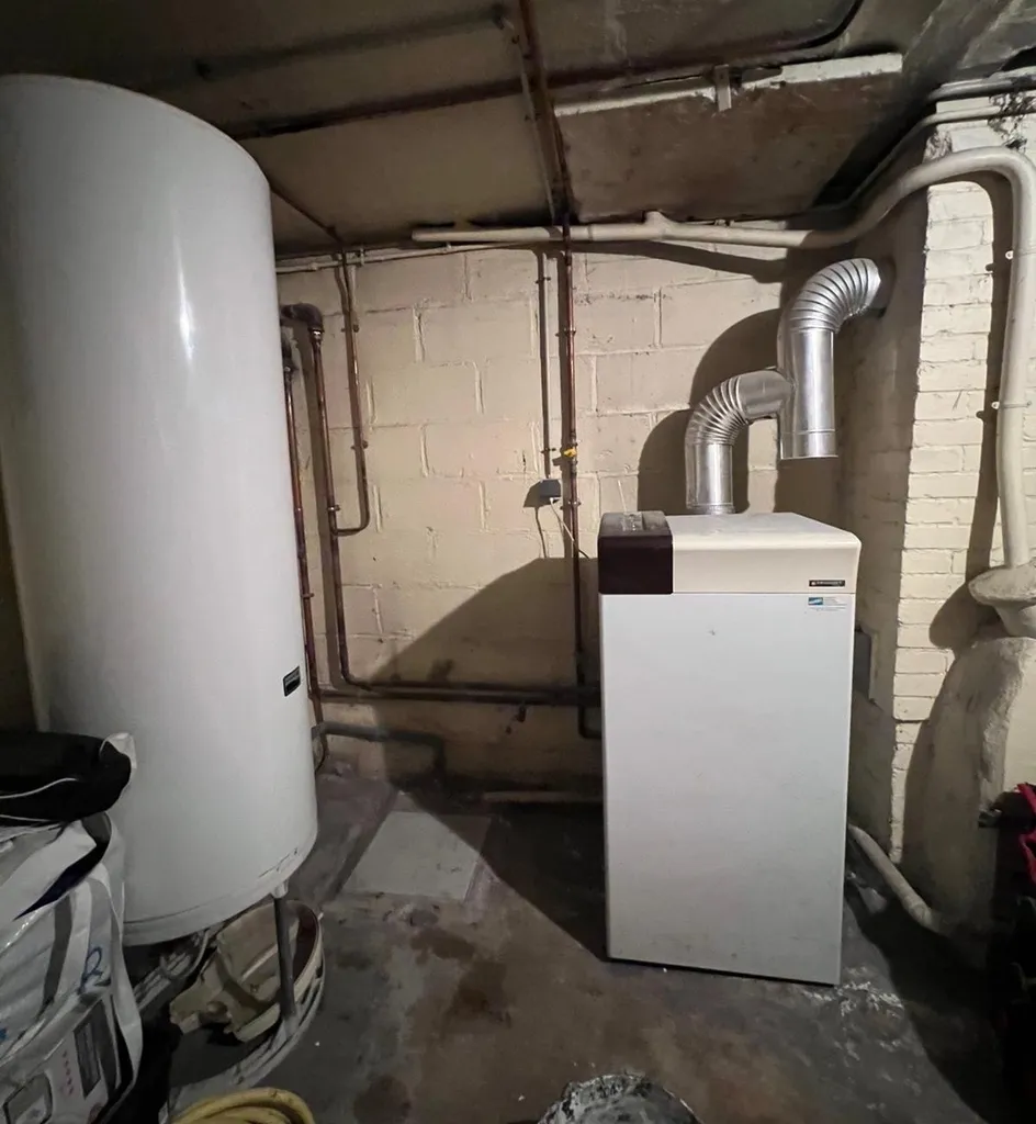 Remplacement d’une chaudière Frisquet à tirage naturel par une chaudière Saunier Duval à condensation à Bondy



