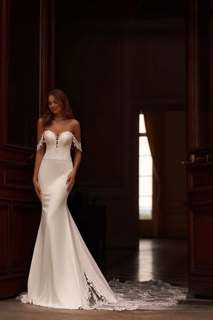 Robe de mariée sirène avec manches tombantes à Marseille