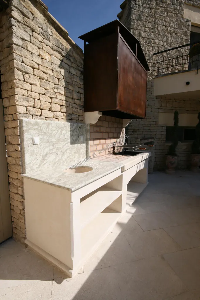 Aménagement cuisine d'été en pierre et granit