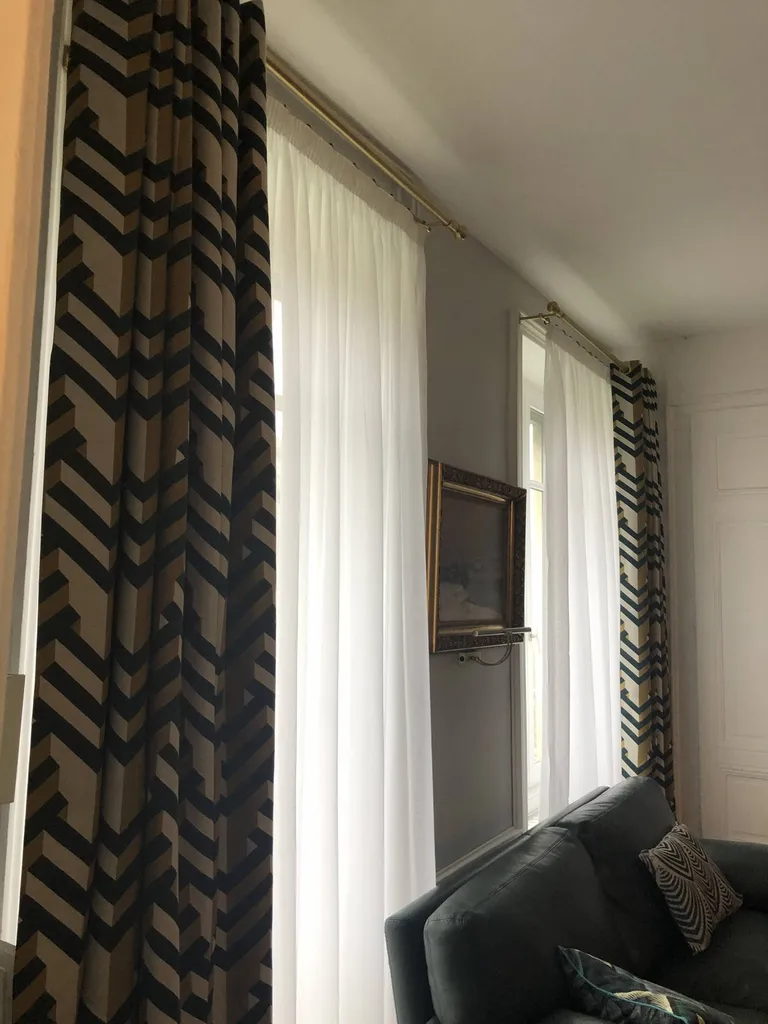 Confection de double rideaux en tête à œillets sur-mesure pour un appartement à Lyon 6