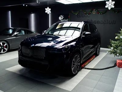 BMW iX1 protégée par film PPF sur bloc avant à Vannes