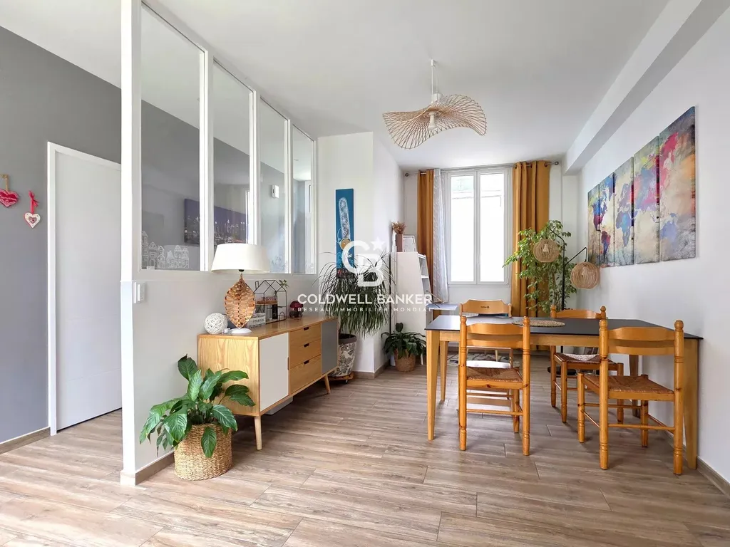 maison rénovée à vendre avec cuisine moderne et accès extérieur jardin dans un quartier recherché du mans