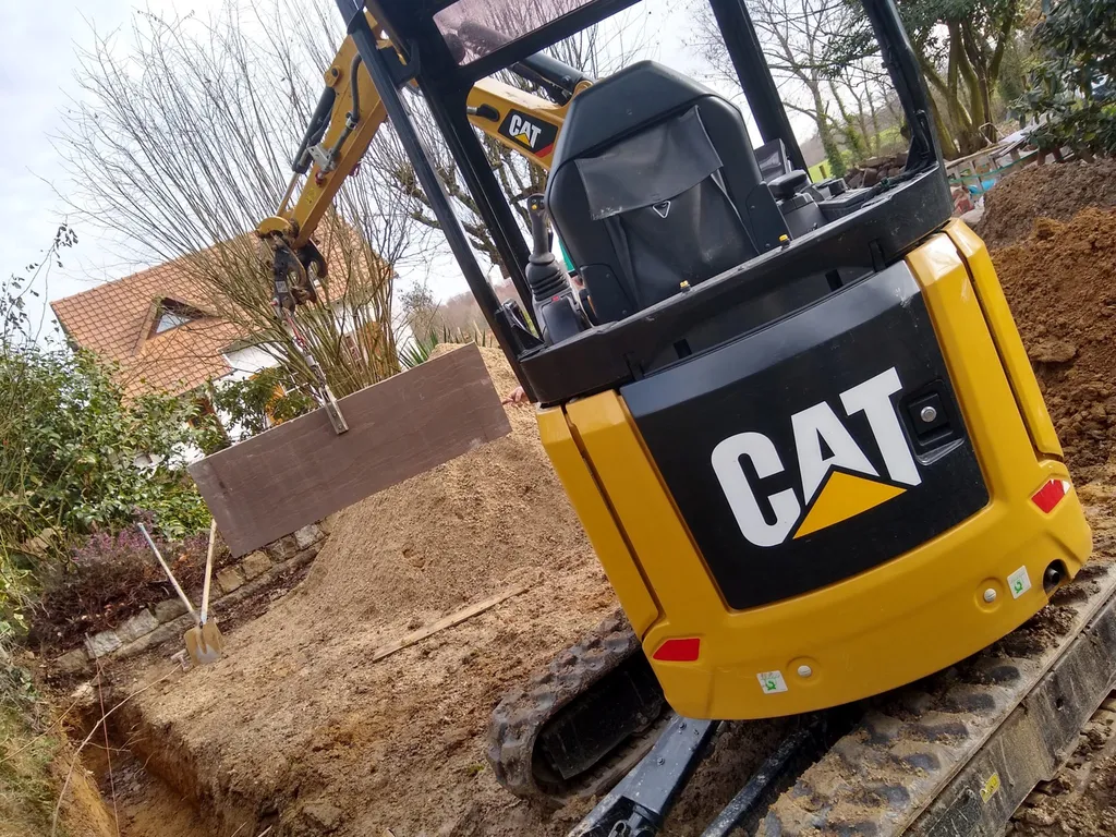 Création minérale complète au Havre (76600) : allée, parking, clôture et murs de soutènement