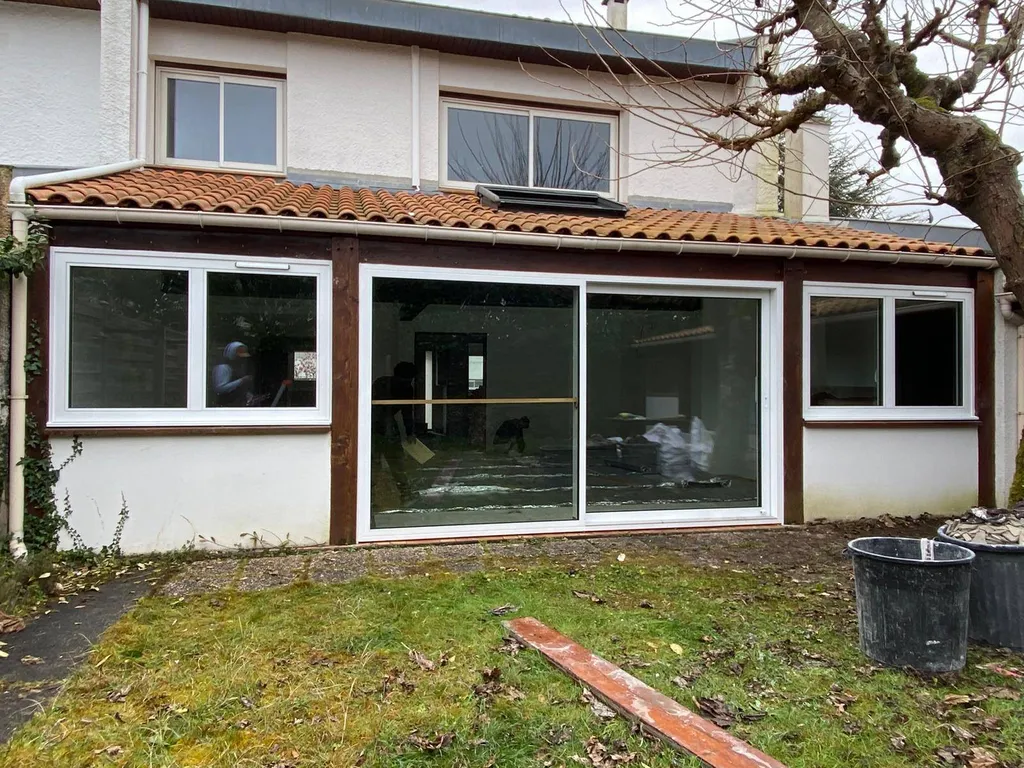 Levant-coulissant triple vitrage aluminium sur Mérignac installé sur mesure par Aquit'M