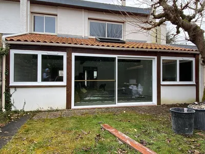 Levant-coulissant triple vitrage aluminium sur Mérignac installé sur mesure par Aquit'M