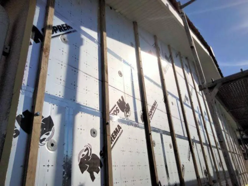 Qui contacter pour faire isoler sa maison par l'extérieur et poser un bardage bois sur le Bassin d'Arcachon ?