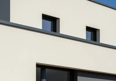 Travaux de crépissage décoratif de façade contemporaine pour finition esthétique durable et protection optimale en Alsace