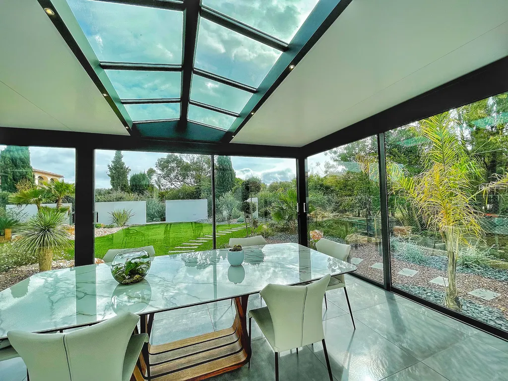 Extension toit plat avec vue sur jardin à Vias