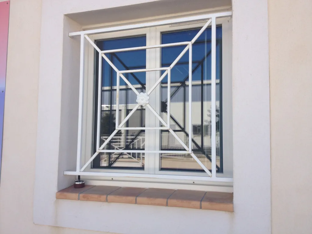 GRILLE AVEC DEFENSIVE MARTIGUES