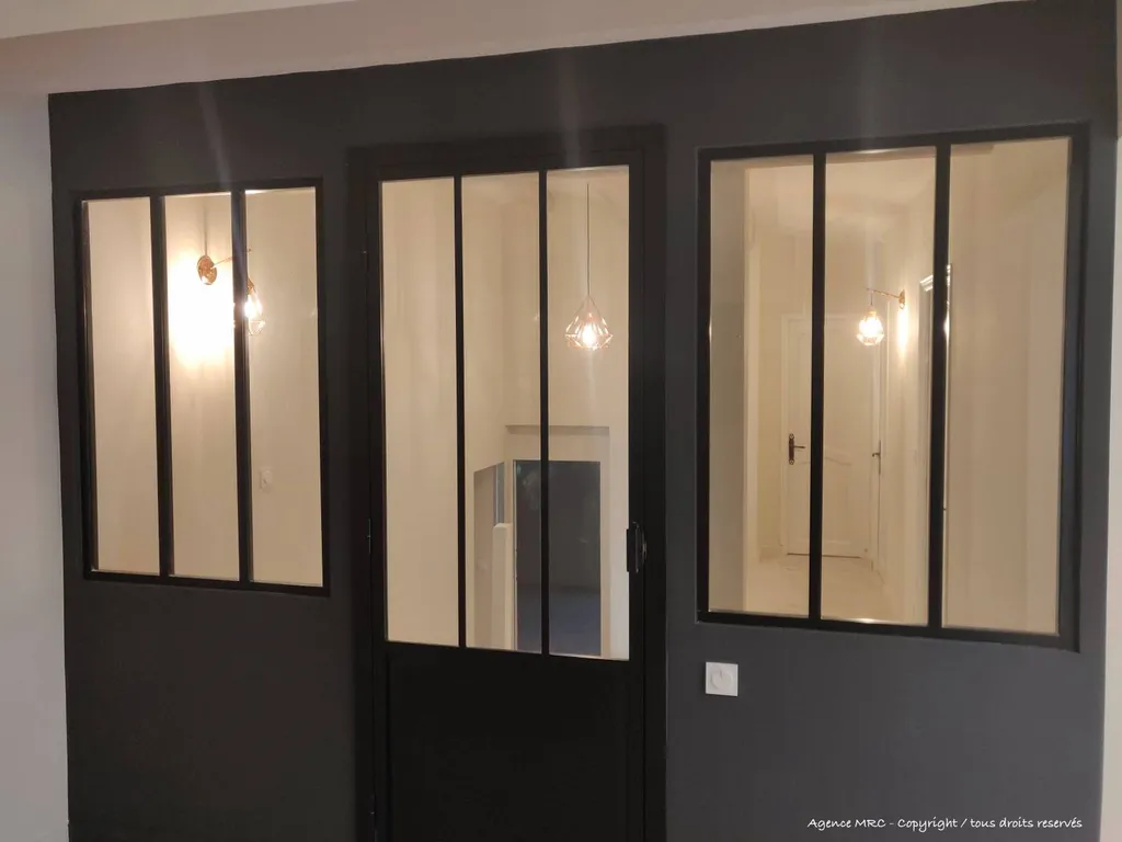 Agrandir un salon d'une maison en déposant un mur porteur sur Aix-En-Provence avec des architectes d’intérieur