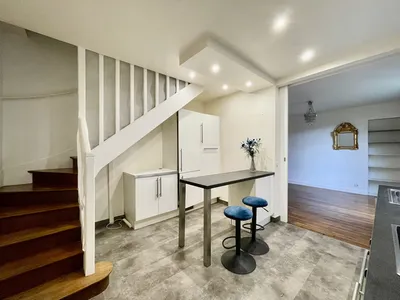 cuisine ouverte vers le salon appartement en vente proposé par Helix immobilier Le VESINET