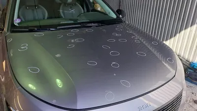 Pavillon marqué impact par impact avant débosselage sans peinture dans notre atelier