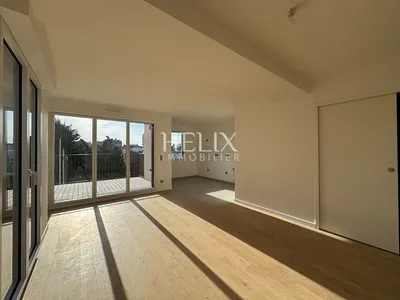 Dans une résidence neuve de Saint Germain en laye un appartement avec 4 chambres, une terrasse avec une vue sur Paris et le château.